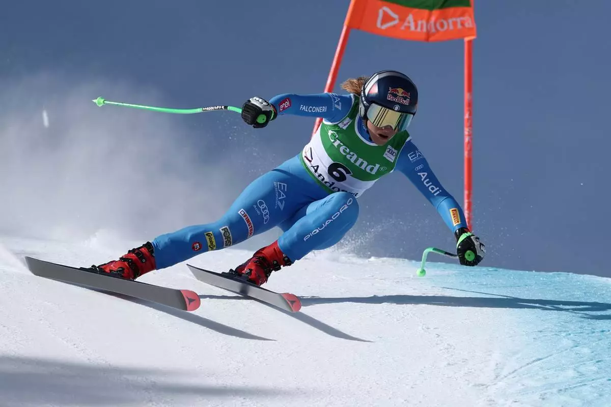 Italy's Sofia Goggia speeds down the course during an alpine ski, women's World Cup downhill, in Soldeu, Andorra, Friday, February. 27, 2026. (AP Photo/Gabriele Facciotti)