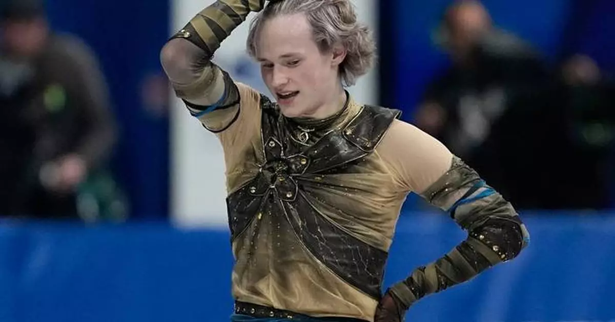 Defending champ US takes lead into final day of team figure skating at the Milano Cortina Olympics