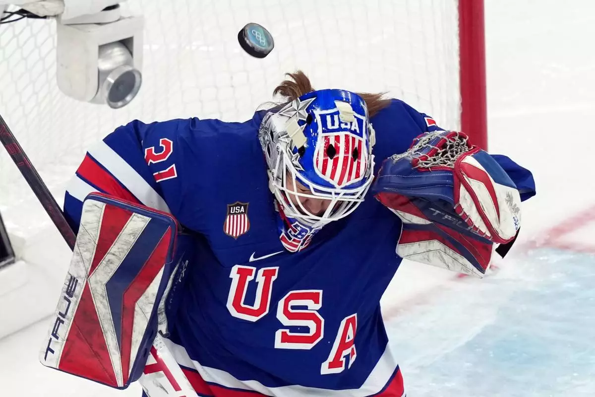 United States goalkeeper Aerin Frankel blocks a shot by Sweden during the second period of a women's ice hockey semifinal match at the 2026 Winter Olympics, in Milan, Italy, Monday, Feb. 16, 2026. (AP Photo/Carolyn Kaster)