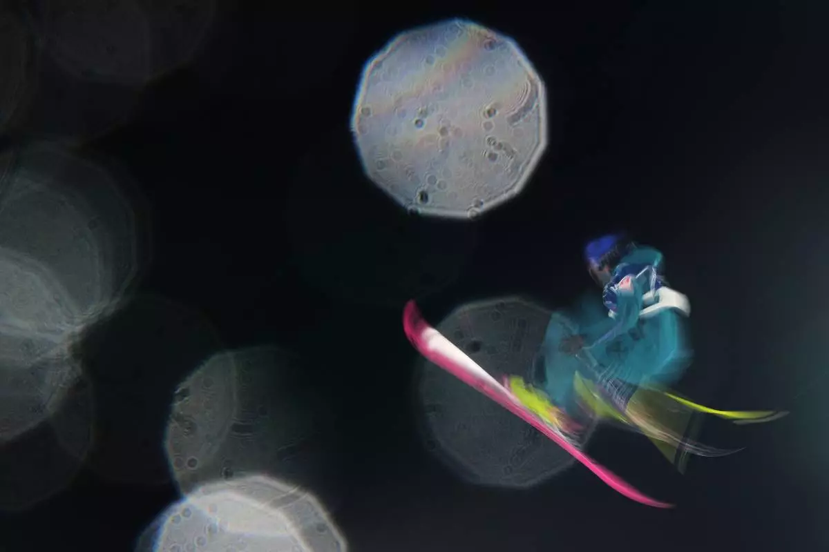 Switzerland's Mathilde Gremaud warms up before the women's freestyle skiing big air qualifications at the 2026 Winter Olympics, in Livigno, Italy, Saturday, Feb. 14, 2026. (AP Photo/Lindsey Wasson)