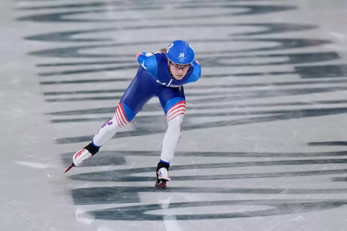 Greta Myers of the U.S. breaks away from the pack in the women's mass start semifinal speedskating races at the 2026 Winter Olympics, in Milan, Italy, Saturday, Feb. 21, 2026. (AP Photo/Luca Bruno)