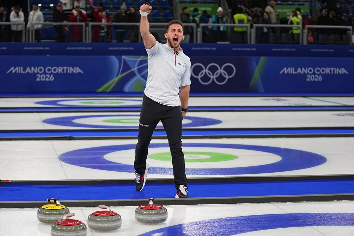 United States' Korey Dropkin reacts following the semi-finals round of the mixed doubles curling match against Italy, at the 2026 Winter Olympics, in Cortina d'Ampezzo, Italy, Monday, Feb. 9, 2026. (AP Photo/Fatima Shbair)
