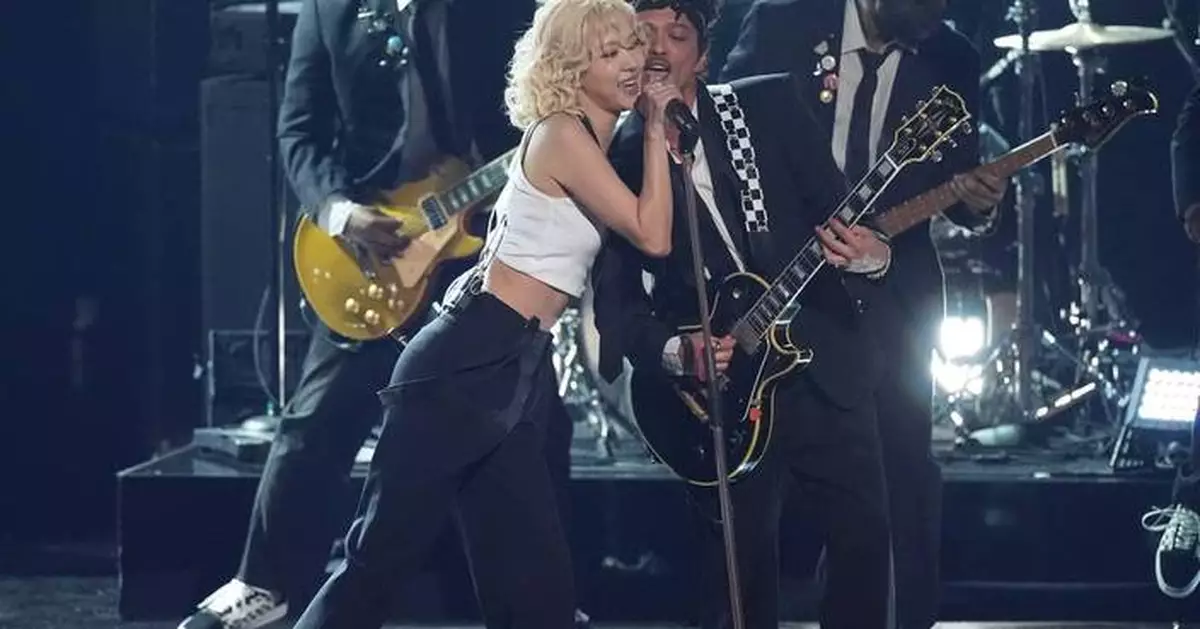 The Grammys had lots of Mars, Carpenter soaring and a near-naked Bieber. Here are some key moments