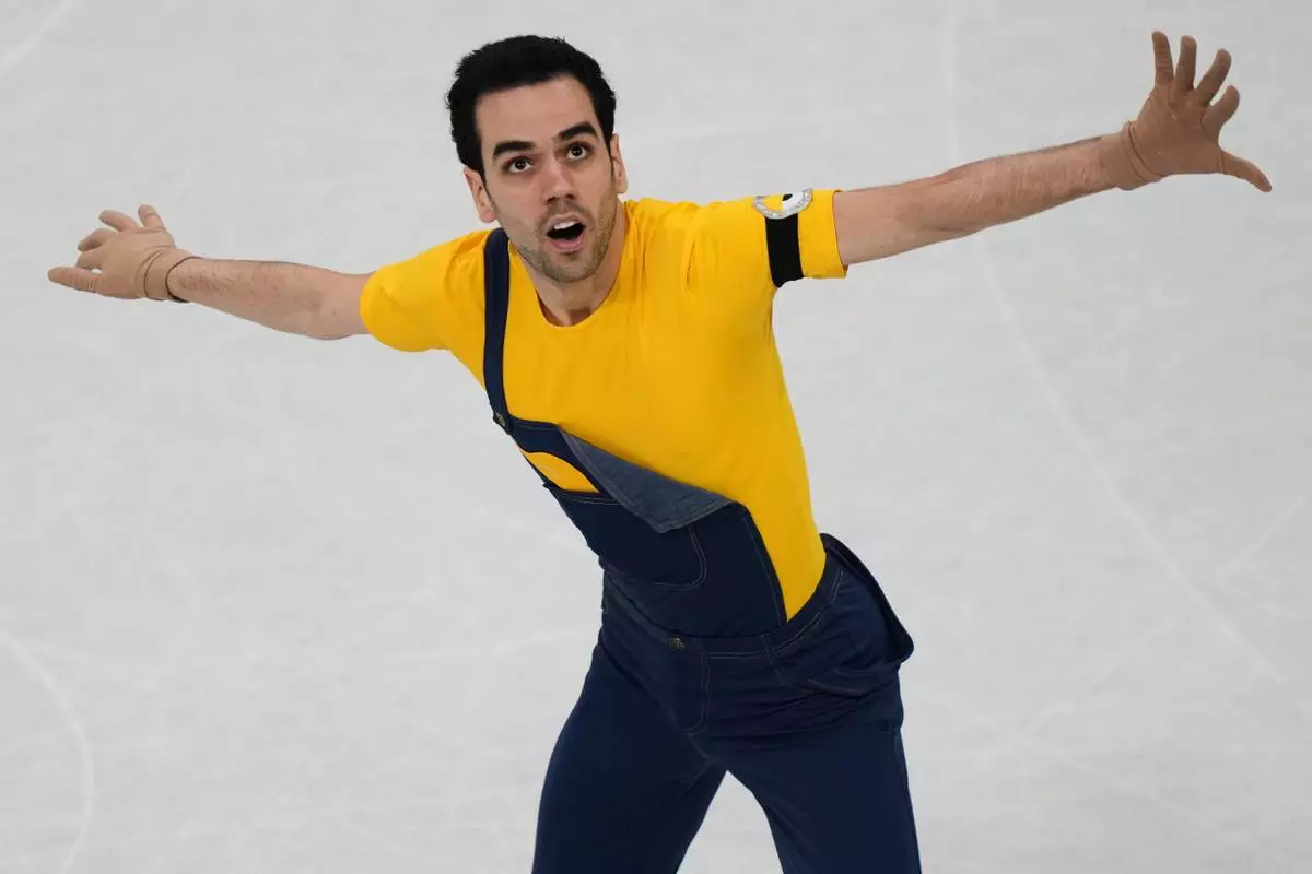 Tomas Guarino Sabate of Spain competes during the men's figure skating short program at the 2026 Winter Olympics, in Milan, Italy, Tuesday, Feb. 10, 2026. (AP Photo/Stephanie Scarbrough)