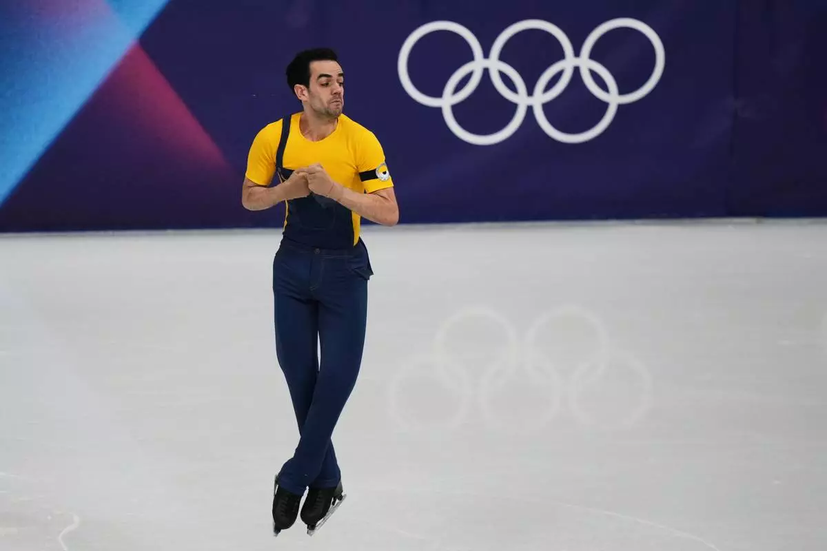 Tomas Guarino Sabate of Spain competes during the men's figure skating short program at the 2026 Winter Olympics, in Milan, Italy, Tuesday, Feb. 10, 2026. (AP Photo/Stephanie Scarbrough)