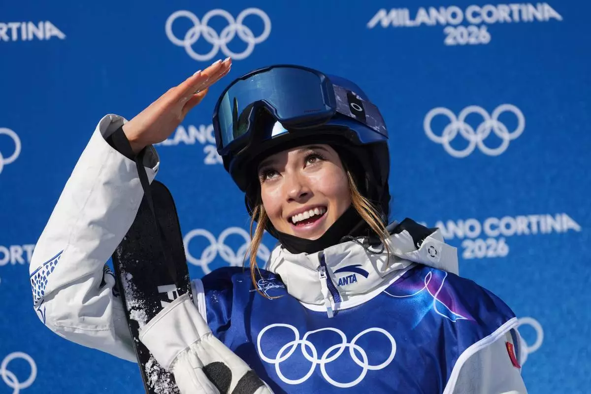 China's Eileen Gu reacts during the women's freestyle skiing halfpipe final at the 2026 Winter Olympics, in Livigno, Italy, Sunday, Feb. 22, 2026. (AP Photo/Lindsey Wasson)