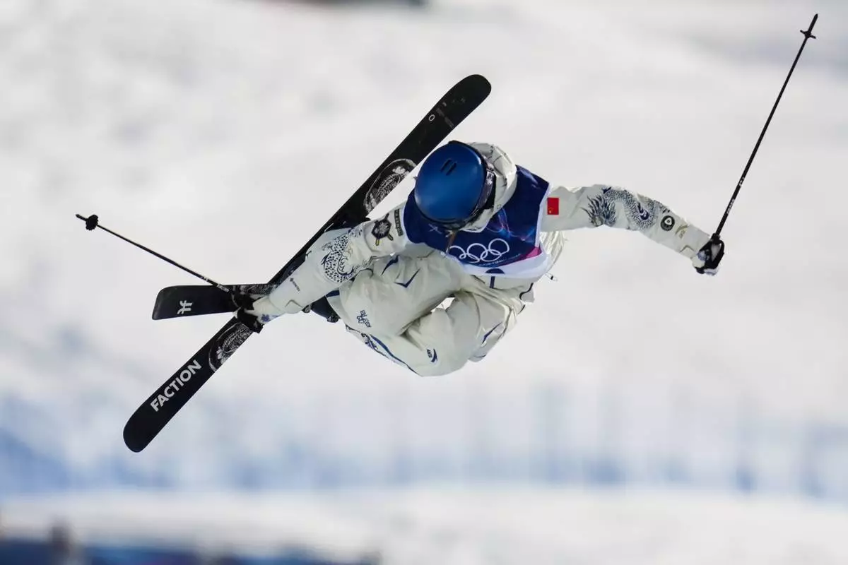 China's Eileen Gu competes during the women's freestyle skiing halfpipe final at the 2026 Winter Olympics, in Livigno, Italy, Sunday, Feb. 22, 2026. (AP Photo/Abbie Parr)