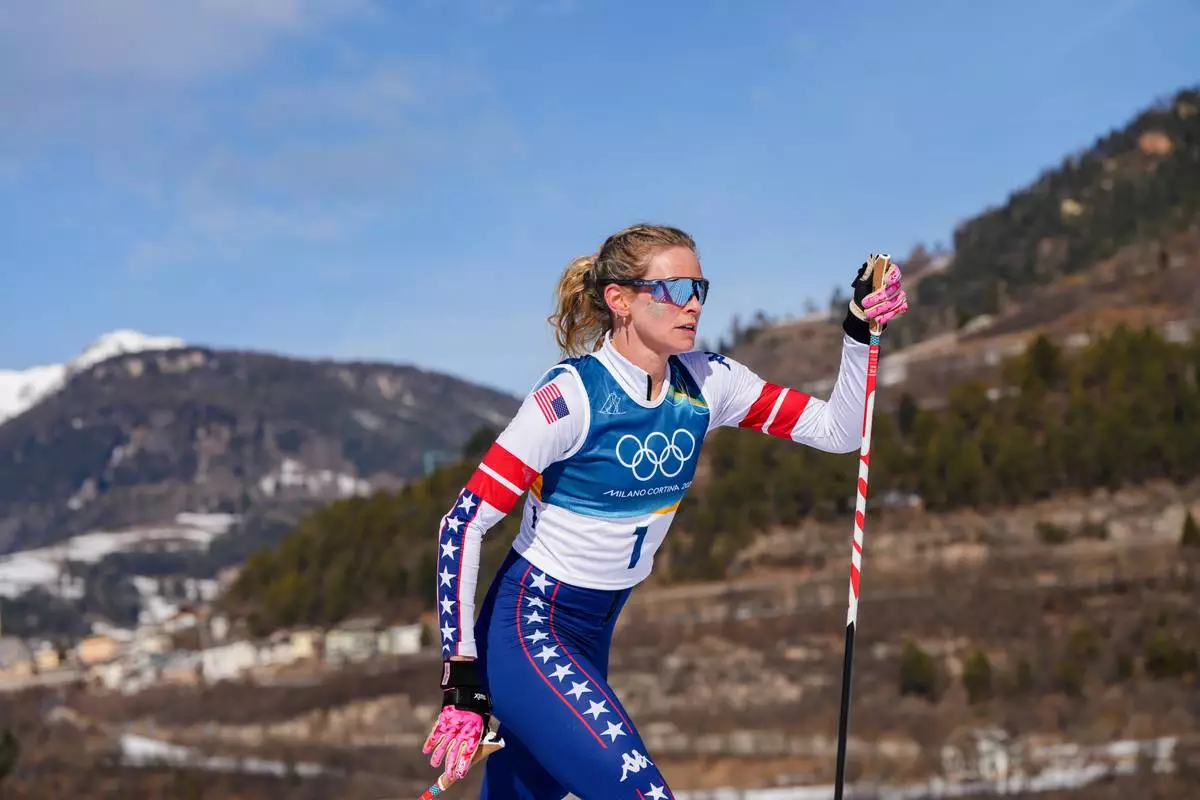 Jessie Diggins, of the United States, competes in the cross country skiing women's 50km mass start classic at the 2026 Winter Olympics, in Tesero, Italy, Sunday, Feb. 22, 2026. (AP Photo/Kirsty Wigglesworth)