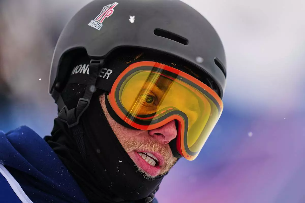 Britain's Gus Kenworthy looks on during the men's freestyle skiing halfpipe qualifications at the 2026 Winter Olympics, in Livigno, Italy, Friday, Feb. 20, 2026. (AP Photo/Julia Demaree Nikhinson)