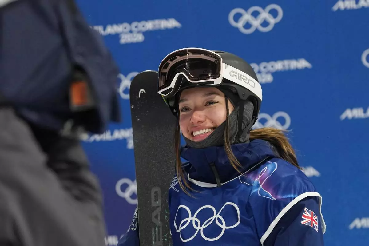 Britain's Zoe Atkin reacts during the women's freestyle skiing halfpipe qualifications at the 2026 Winter Olympics, in Livigno, Italy, Thursday, Feb. 19, 2026. (AP Photo/Gregory Bull)