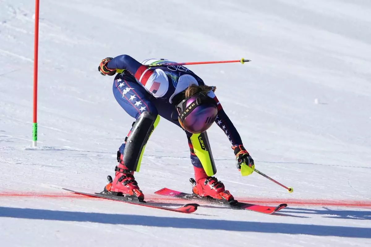 United States' Mikaela Shiffrin crosses the finish line to win an alpine ski, women's slalom race, at the 2026 Winter Olympics, in Cortina d'Ampezzo, Italy, Wednesday, Feb. 18, 2026. (AP Photo/Jacquelyn Martin)