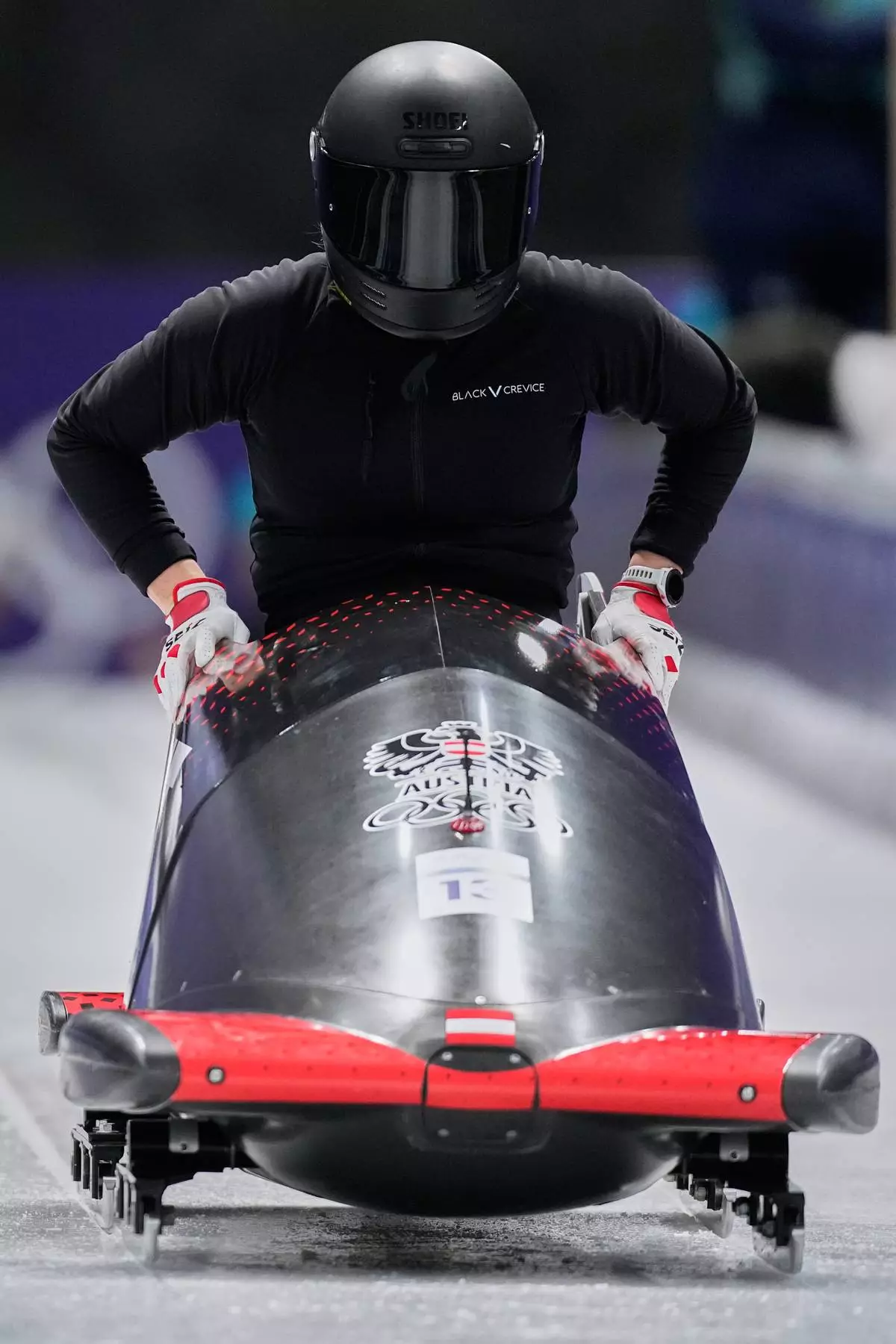 Austria's Katrin Beierl starts for a women's monobob training session at the 2026 Winter Olympics, in Cortina d'Ampezzo, Italy, Thursday, Feb. 12, 2026. (AP Photo/Alessandra Tarantino)