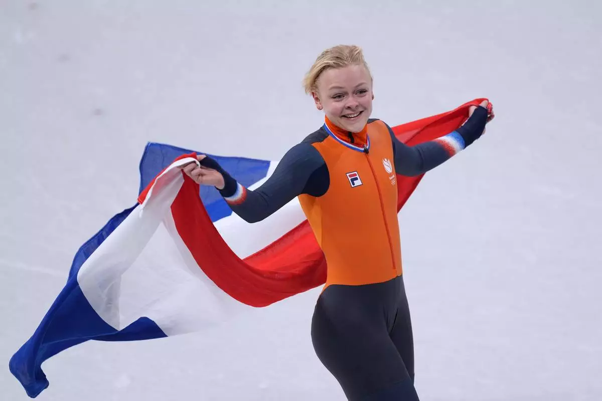 Xandra Velzeboer of the Netherlands wins gold during the short track speed skating women's 500m at the 2026 Winter Olympics, in Milan, Italy, Thursday, Feb. 12, 2026. (AP Photo/Stephanie Scarbrough)