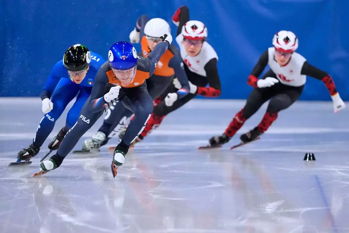 Xandra Velzeboer of the Netherlands wins gold during the short track speed skating women's 500m at the 2026 Winter Olympics, in Milan, Italy, Thursday, Feb. 12, 2026. (AP Photo/Natacha Pisarenko)