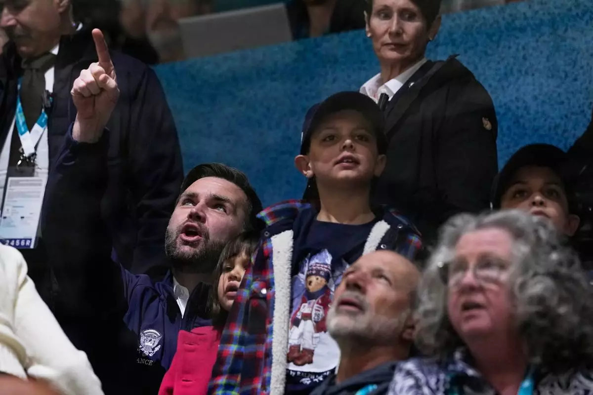 Vice President JD Vance visits a preliminary round match of women's ice hockey between United States and Czechia at the 2026 Winter Olympics, in Milan, Italy, Thursday, Feb. 5, 2026. (AP Photo/Petr David Josek)