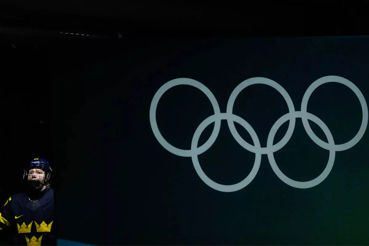 Sweden's Lina Ljungblom (25) arrives for the warm up ahead of a women's ice hockey bronze medal game between Switzerland and Sweden at the 2026 Winter Olympics, in Milan, Italy, Thursday, Feb. 19, 2026. (AP Photo/Petr David Josek)