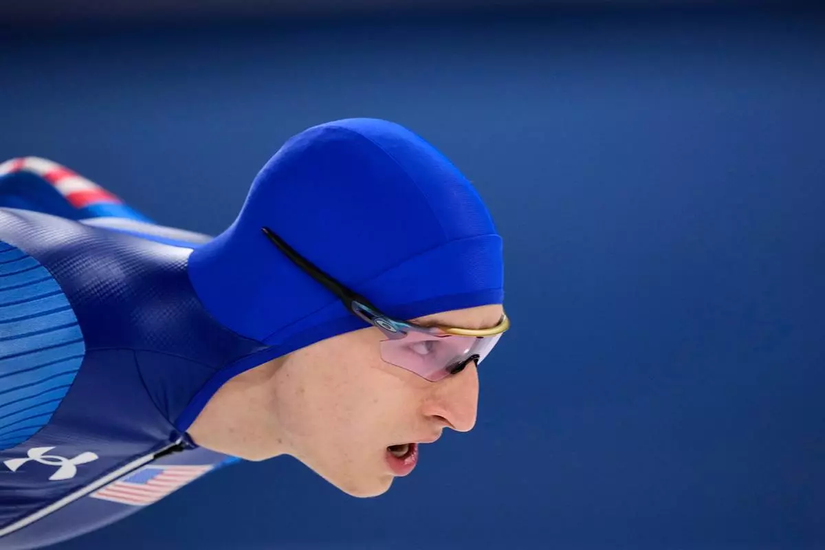 Jordan Stolz of the U.S. took a silver medal in the men's 1500 meters speedskating race at the 2026 Winter Olympics, in Milan, Italy, Thursday, Feb. 19, 2026. (AP Photo/Ben Curtis)