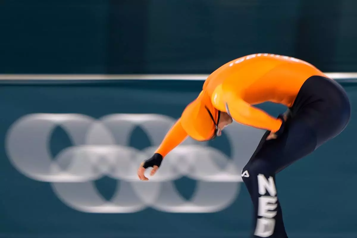Joep Wennemars of the Netherlands crosses the finish line to take fourth place in the men's 1500 meters speedskating race at the 2026 Winter Olympics, in Milan, Italy, Thursday, Feb. 19, 2026. (AP Photo/Ben Curtis)