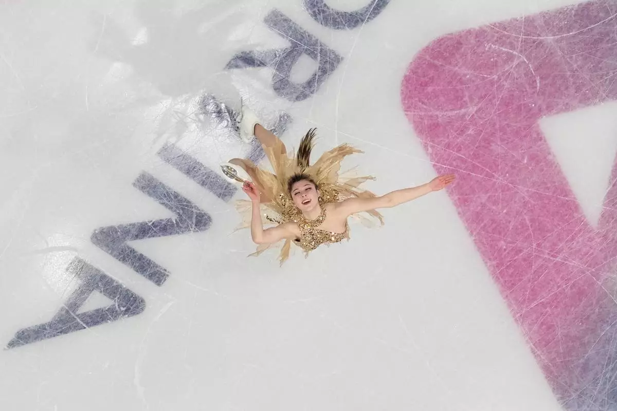 Alysa Liu of the United States competes during the women's figure skating free program at the 2026 Winter Olympics, in Milan, Italy, Thursday, Feb. 19, 2026. (AP Photo/Christophe Ena)
