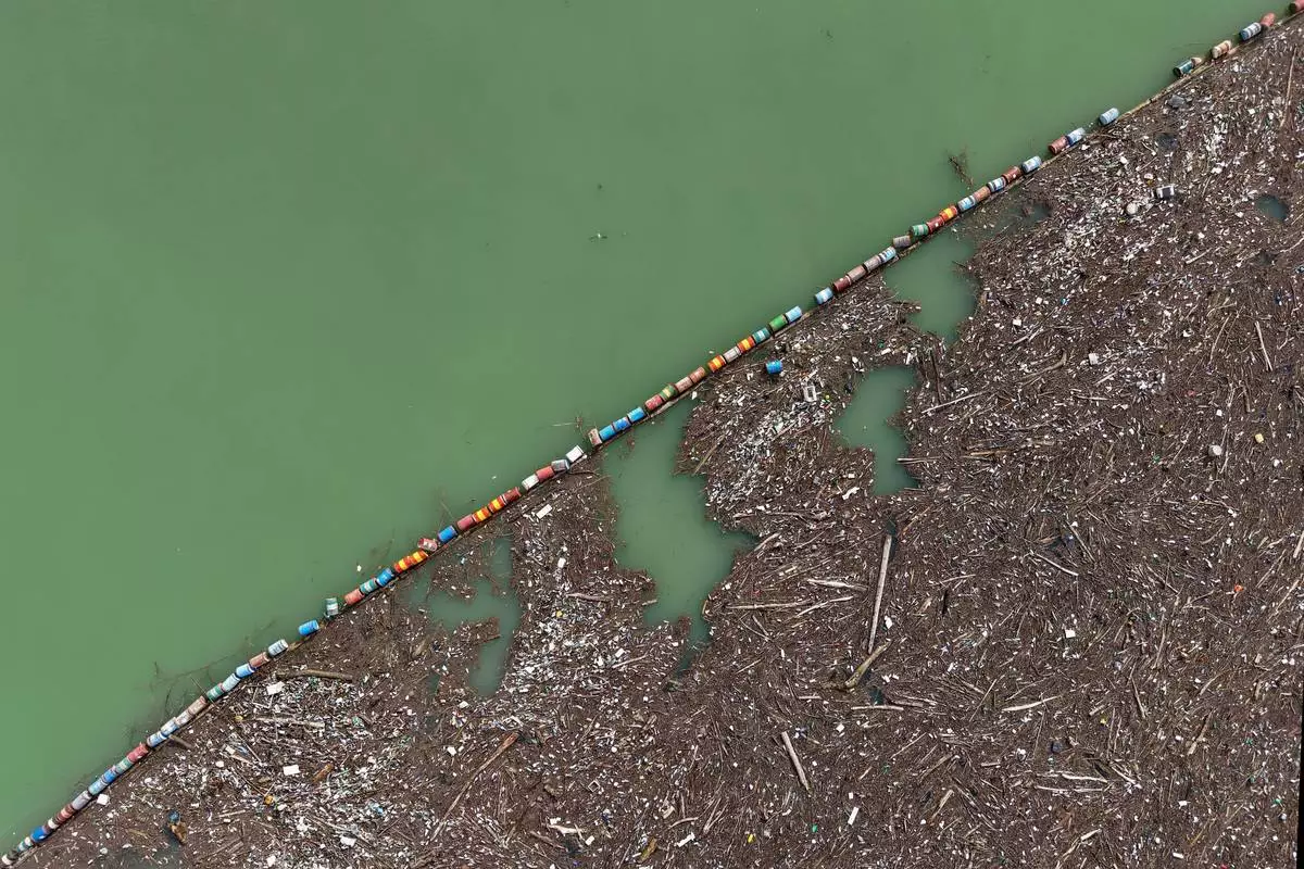 FILE - An aerial view of waste clogging the Drina river in Visegrad, Bosnia, Feb. 5, 2026. (AP Photo/Armin Durgut, File)