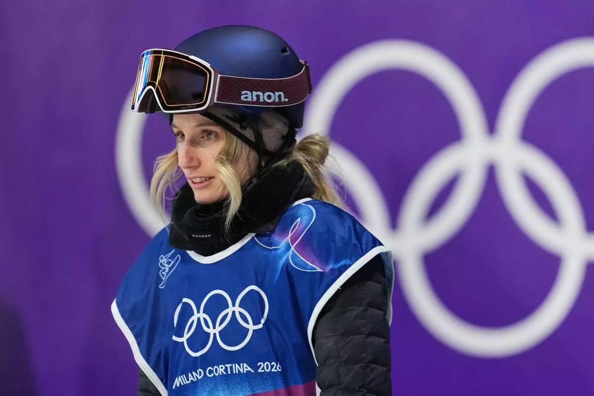 Austria's Anna Gasser reacts during the women's snowboarding big air finals at the 2026 Winter Olympics, in Livigno, Italy, Monday, Feb. 9, 2026. (AP Photo/Lindsey Wasson)