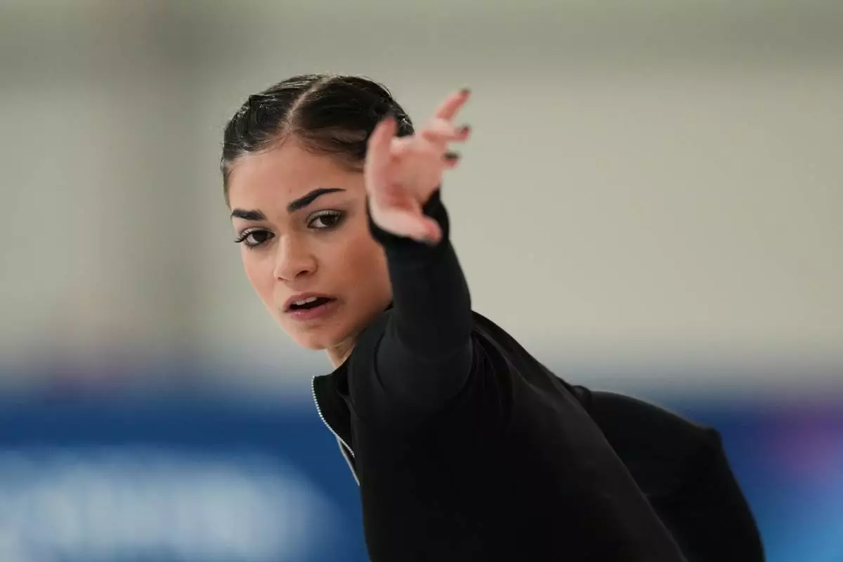 Individual Neutral Athlete Adeliia Petrosian skates during a figure skating practice session at the 2026 Winter Olympics, in Milan, Italy, Monday, Feb. 16, 2026. (AP Photo/Stephanie Scarbrough)