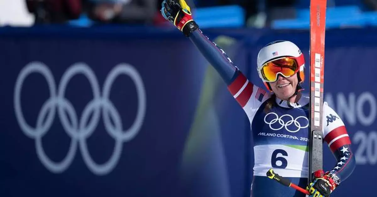 Breezy Johnson's winding road leads to Olympic downhill gold for US on day marred by Vonn's crash