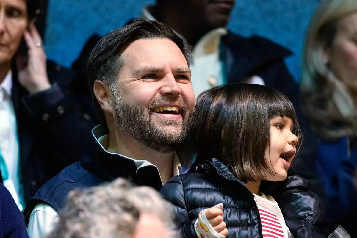 Vice President JD Vance attends a preliminary round match of women's ice hockey between the United States and Finland at the 2026 Winter Olympics, in Milan, Italy, Saturday, Feb. 7, 2026. (AP Photo/Petr David Josek)