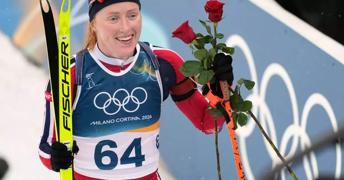 Maren Kirkeeide of Norway takes gold in the biathlon sprint during her Olympic debut