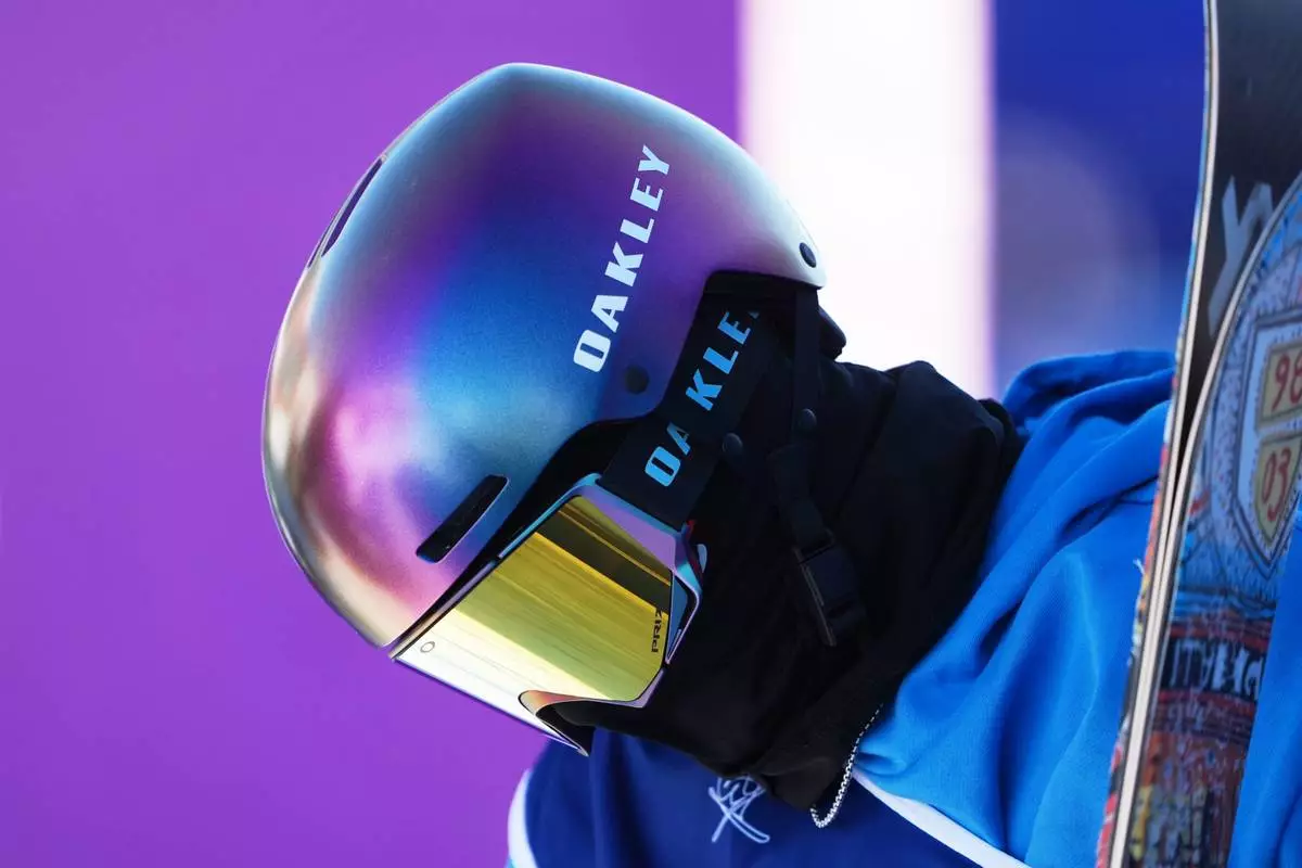 Italy's Miro Tabanelli reacts during men's freestyle skiing slopestyle qualifications at the 2026 Winter Olympics, in Livigno, Italy, Saturday, Feb. 7, 2026. (AP Photo/Lindsey Wasson)