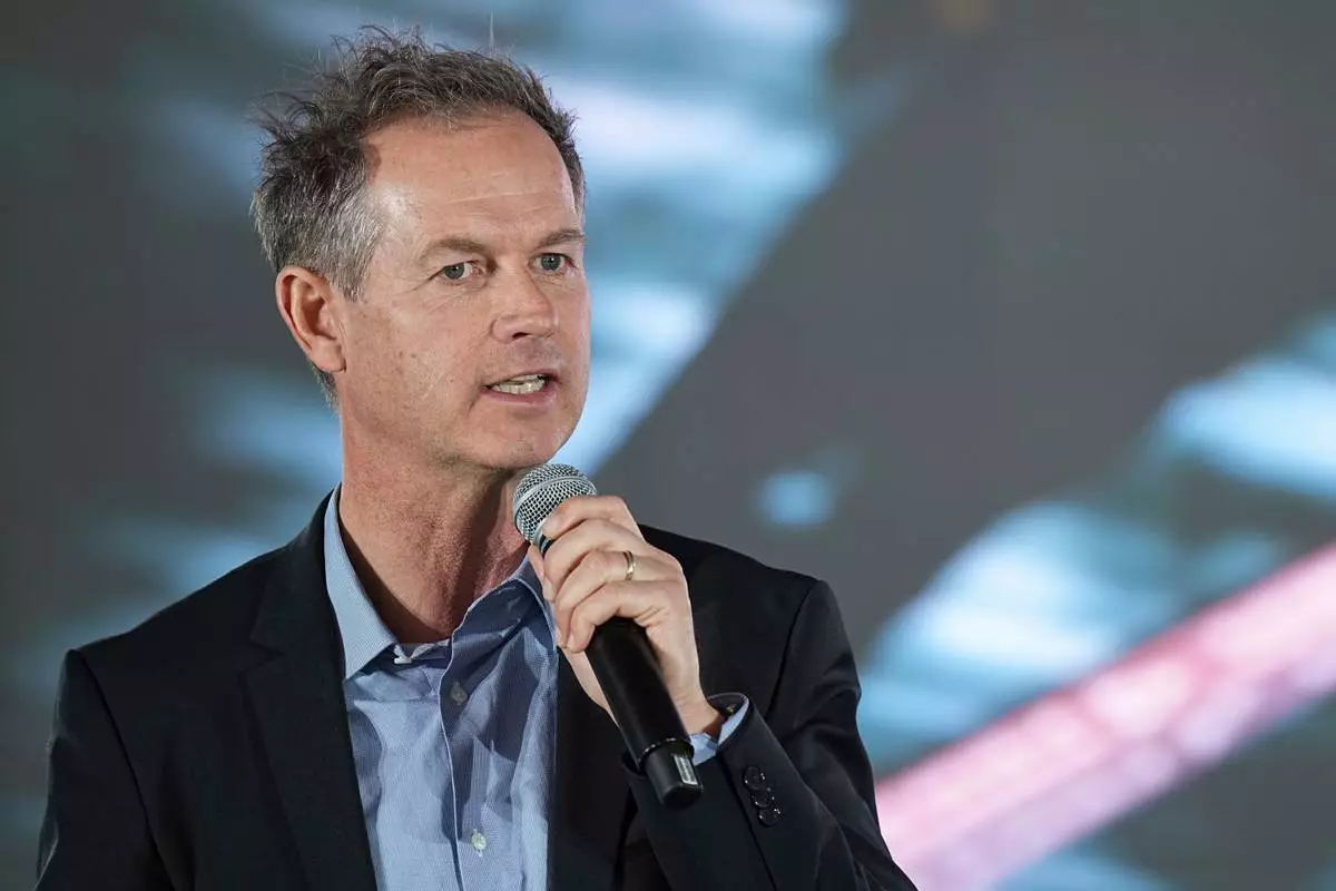 FILE - Head of 2030 Olympic Winter Games, Edgar Grospiron, delivers a speech during a press conference to launch the organizing committee for the 2030 Olympic and Paralympic Winter Games, in Decines, outside Lyon, France, Feb. 18, 2025. (AP Photo/Laurent Cipriani, File)
