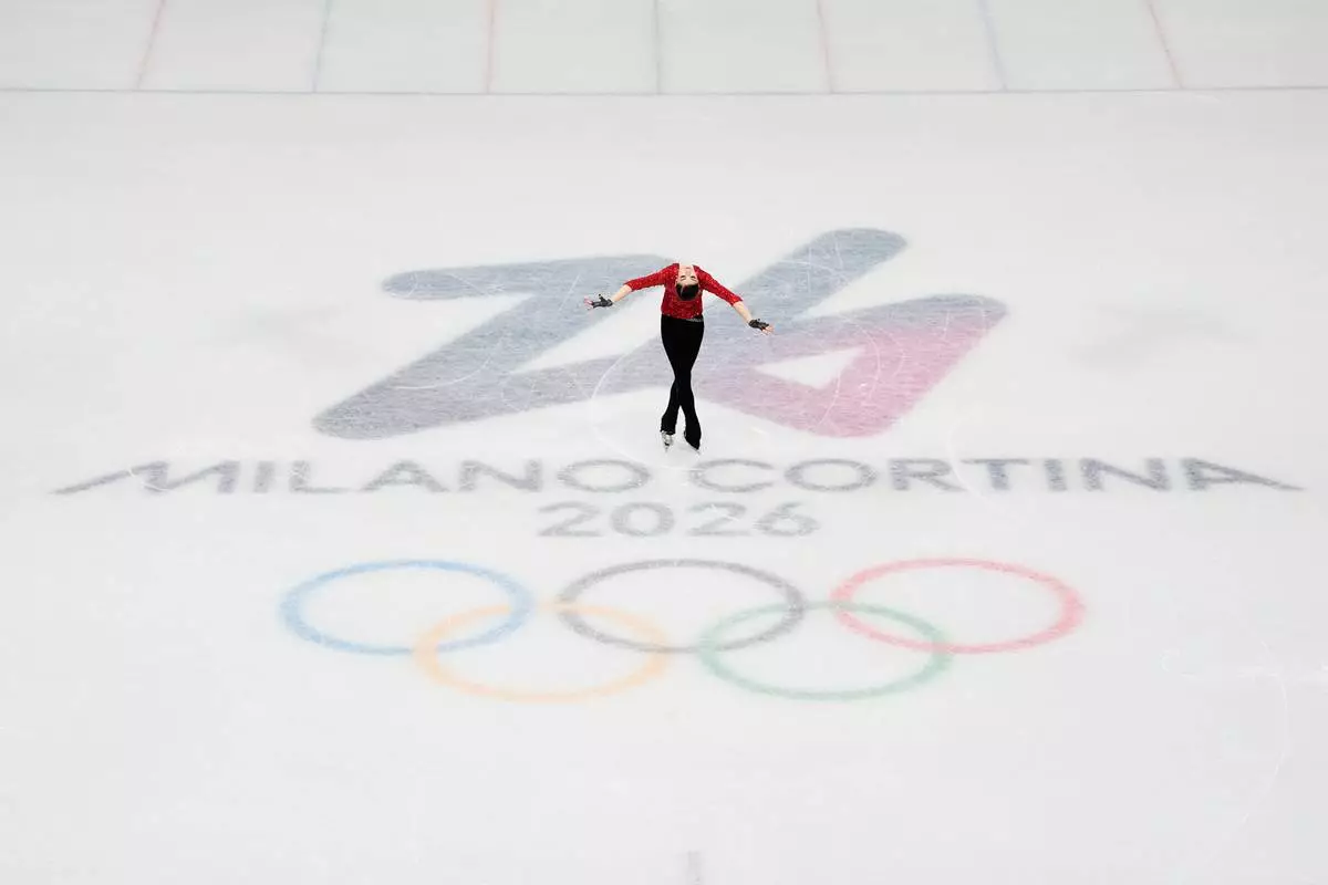 Adeliia Petrosian of Individual Neutral Athletes competes during the women's short program figure skating at the 2026 Winter Olympics, in Milan, Italy, Tuesday, Feb. 17, 2026. (AP Photo/Ashley Landis)