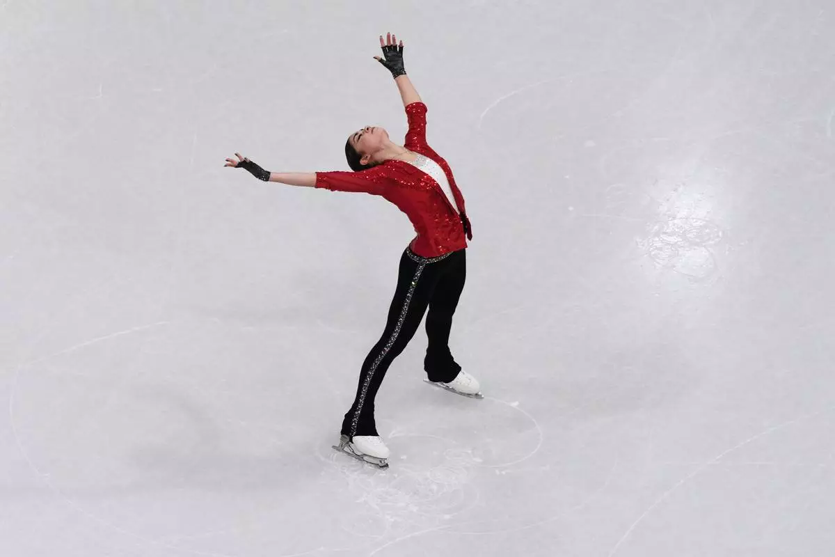 Adeliia Petrosian of Individual Neutral Athletes competes during the women's short program figure skating at the 2026 Winter Olympics, in Milan, Italy, Tuesday, Feb. 17, 2026. (AP Photo/Bernat Armangue)