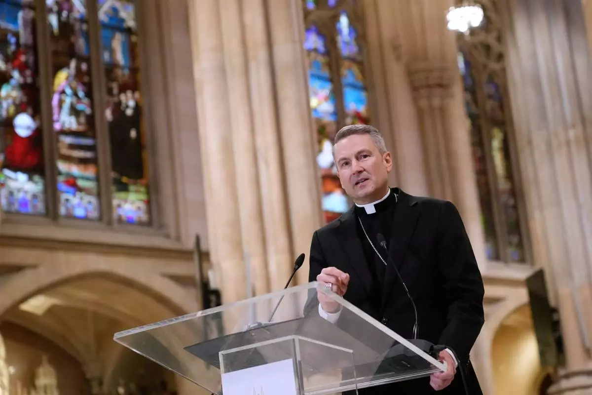Archbishop-designate Ronald Hicks talks to reporters during a news conference at St. Patrick's Cathedral in New York, Thursday, Feb. 5, 2026. (AP Photo/Seth Wenig)