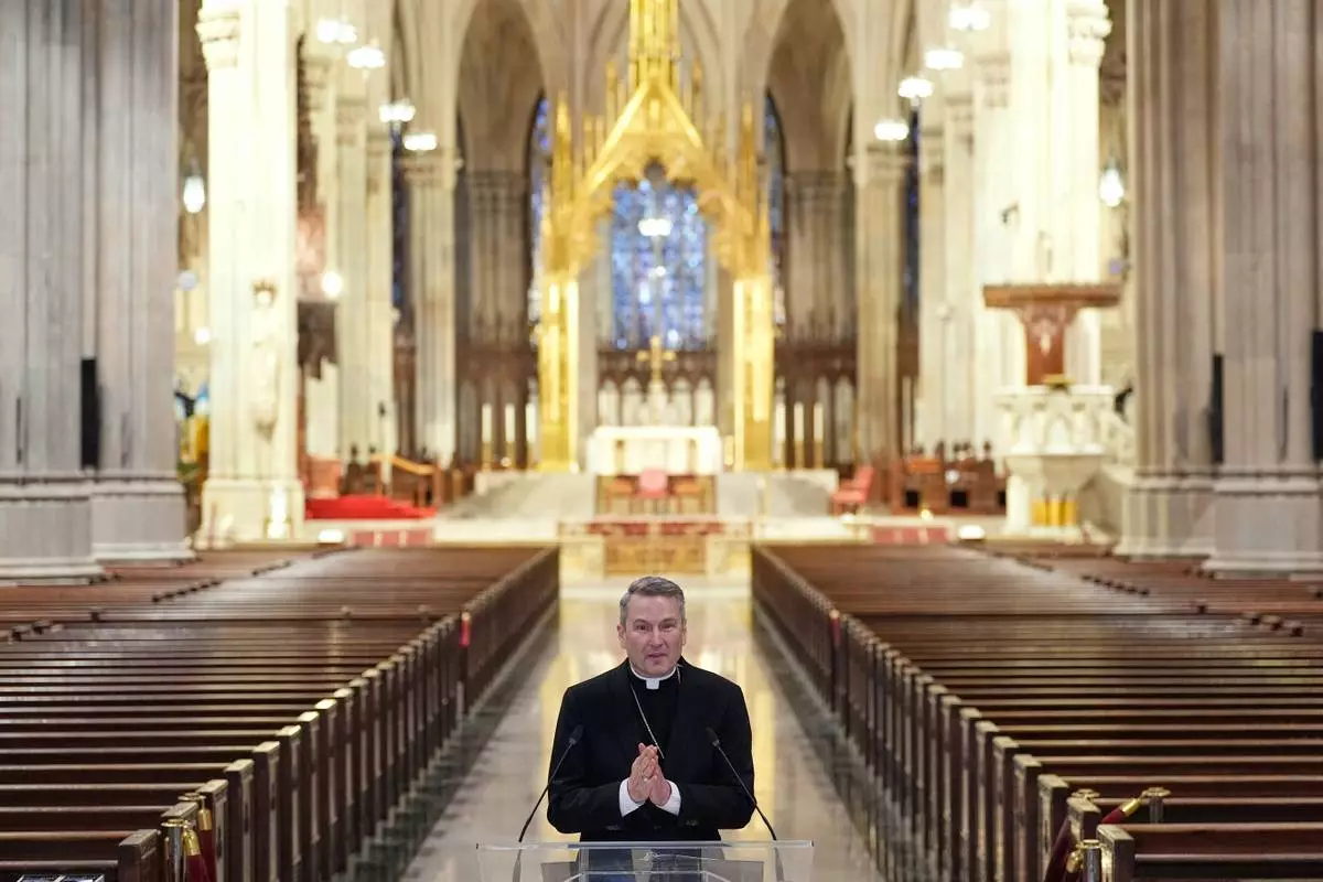 Archbishop-designate Ronald Hicks talks to reporters during a news conference at St. Patrick's Cathedral in New York, Thursday, Feb. 5, 2026. (AP Photo/Seth Wenig)
