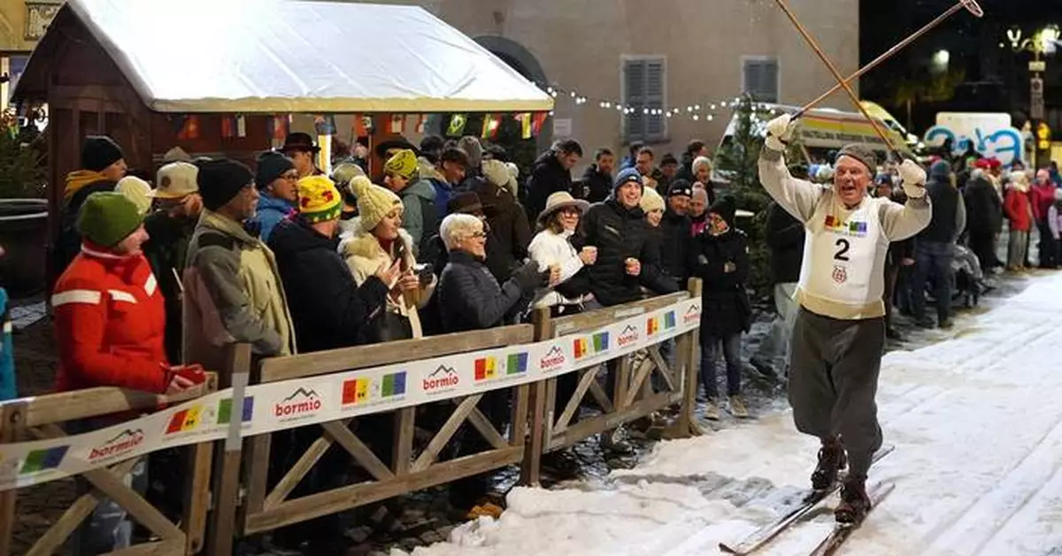 Locals ski through Bormio streets in a traditional cross-country race, in photos