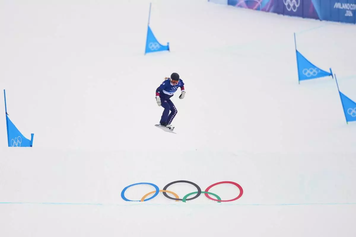 United States' Faye Thelen practices during a snowboard cross training session at the 2026 Winter Olympics, in Livigno, Italy, Friday, Feb. 6, 2026. (AP Photo/Lindsey Wasson)