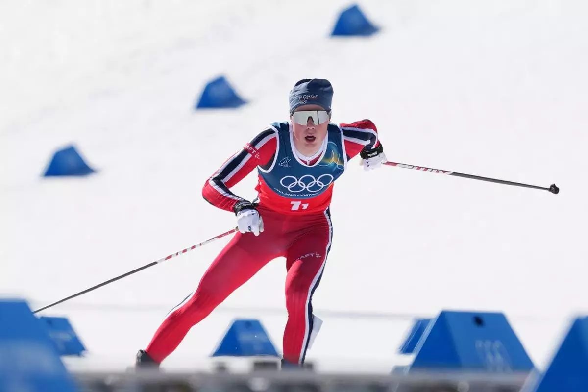 Einar Hedegart, of Norway, competes in the cross-country skiing men's team sprint free at the 2026 Winter Olympics, in Tesero, Italy, Wednesday, Feb. 18, 2026. (AP Photo/Kirsty Wigglesworth)