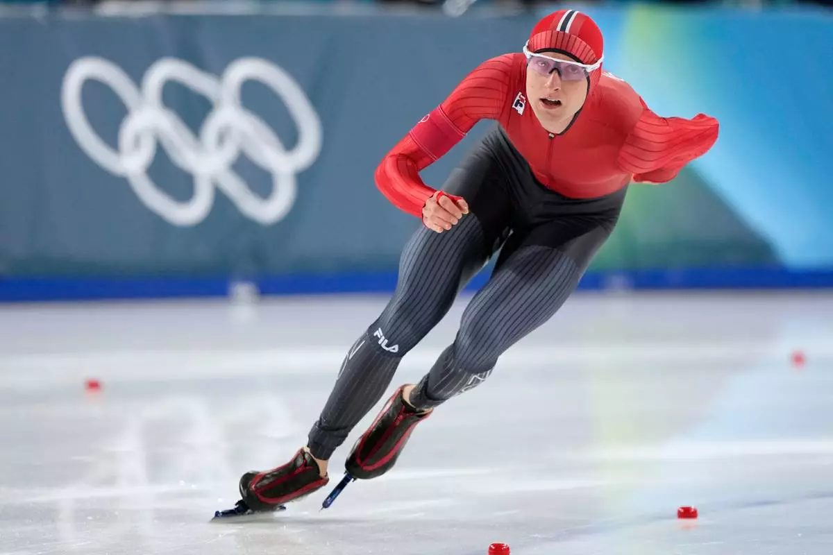 Sander Eitrem of Norway competes in the men's 1500 meters speedskating race at the 2026 Winter Olympics, in Milan, Italy, Thursday, Feb. 19, 2026. (AP Photo/Ben Curtis)