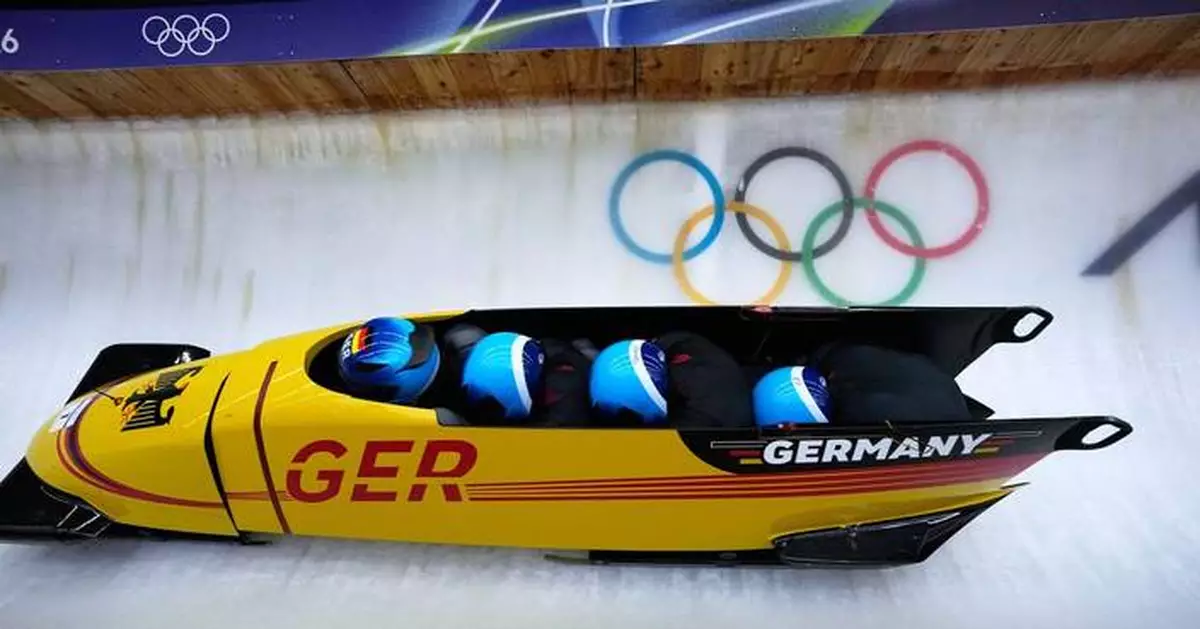 Germany's Johannes Lochner storms to a big early lead in Olympic four-man bobsled