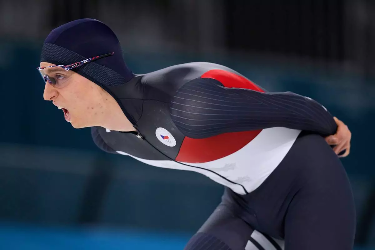 Metodej Jilek of Czechia competes to win the gold medal in the men's 10,000 meters speedskating race at the 2026 Winter Olympics, in Milan, Italy, Friday, Feb. 13, 2026. (AP Photo/Luca Bruno)