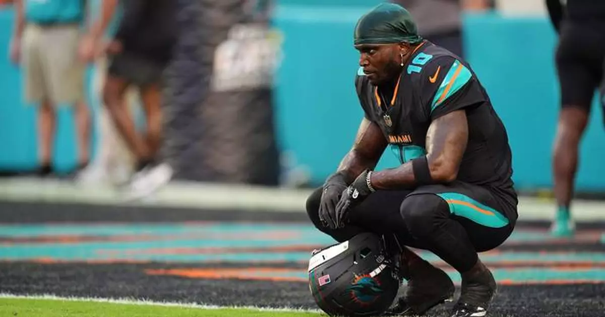 Dolphins releasing star receiver Tyreek Hill in major roster cuts, AP source says