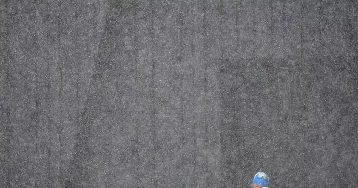 Athletes and fans brave the snow and cold at the Winter Games, in photos