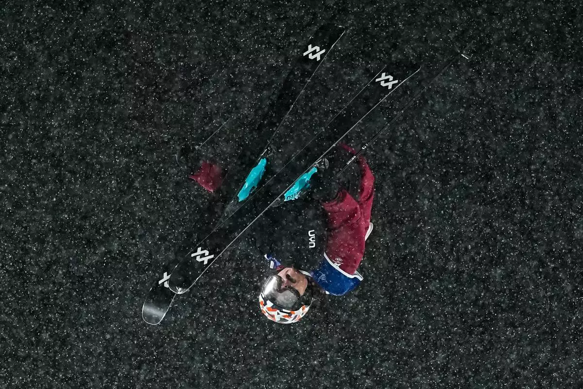 Austria's Lara Wolf competes during the women's freestyle skiing big air finals at the 2026 Winter Olympics, in Livigno, Italy, Monday, Feb. 16, 2026. (AP Photo/Gregory Bull)