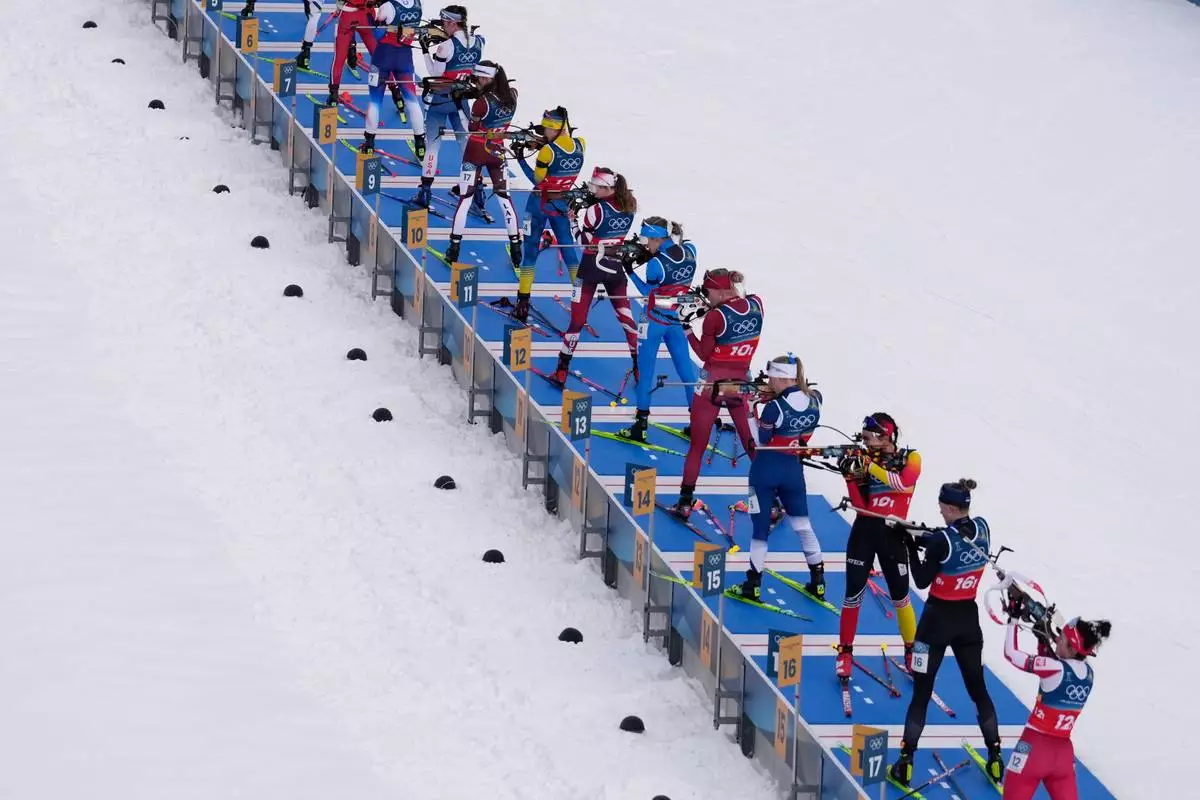 Athletes compete in the women's 4x6-kilometer relay biathlon race at the 2026 Winter Olympics in Anterselva, Italy, Wednesday, Feb. 18, 2026. (AP Photo/Mosa'ab Elshamy)