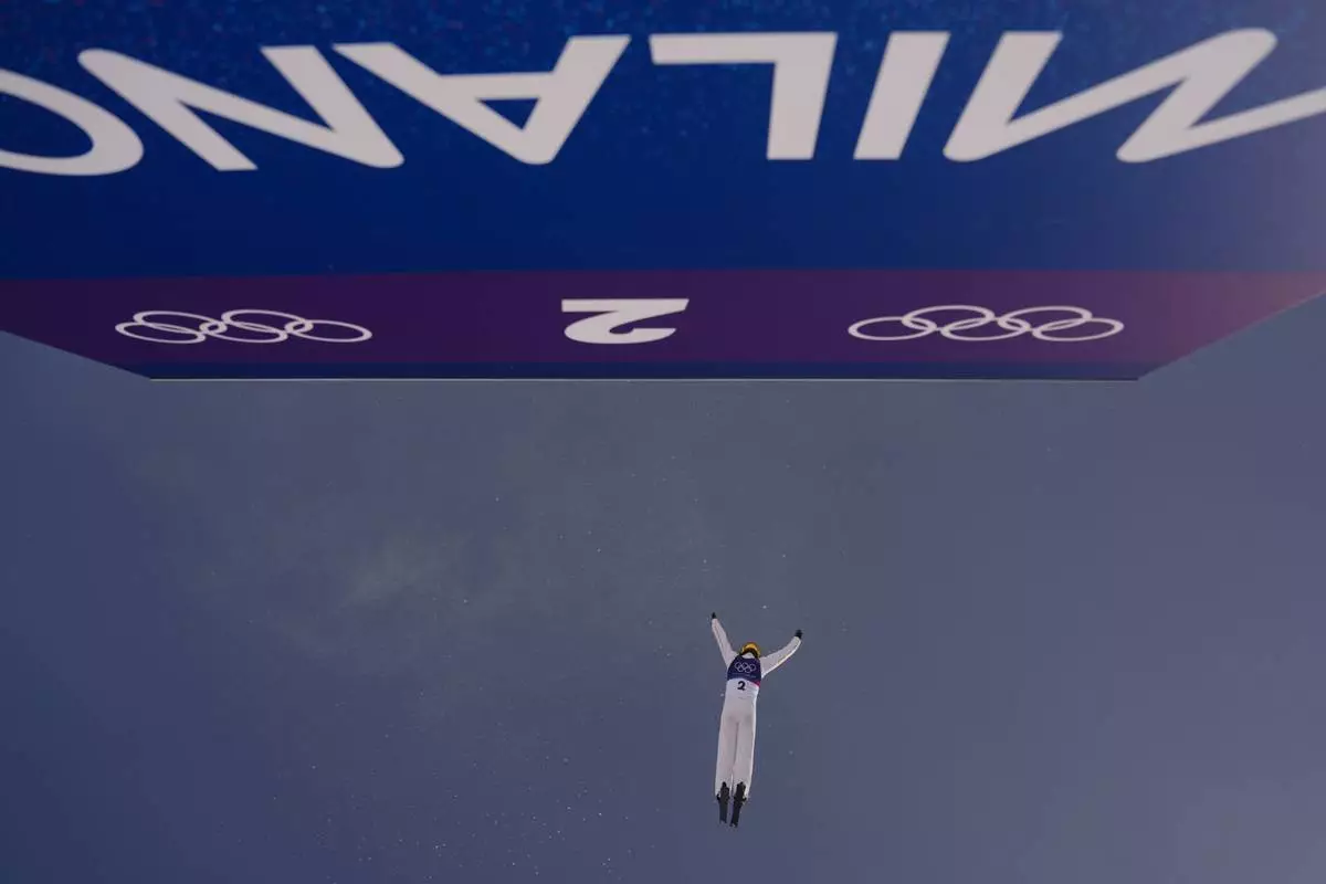 China's Fanyu Kong (2) practices before the women's freestyle skiing aerials qualifications at the 2026 Winter Olympics, in Livigno, Italy, Wednesday, Feb. 18, 2026. (AP Photo/Julia Demaree Nikhinson)