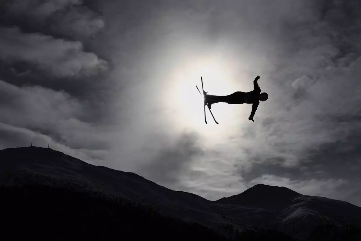 Czechia's Adela Merkova (22) competes during the women's freestyle skiing aerials qualifications at the 2026 Winter Olympics, in Livigno, Italy, Wednesday, Feb. 18, 2026. (AP Photo/Gabriele Facciotti)