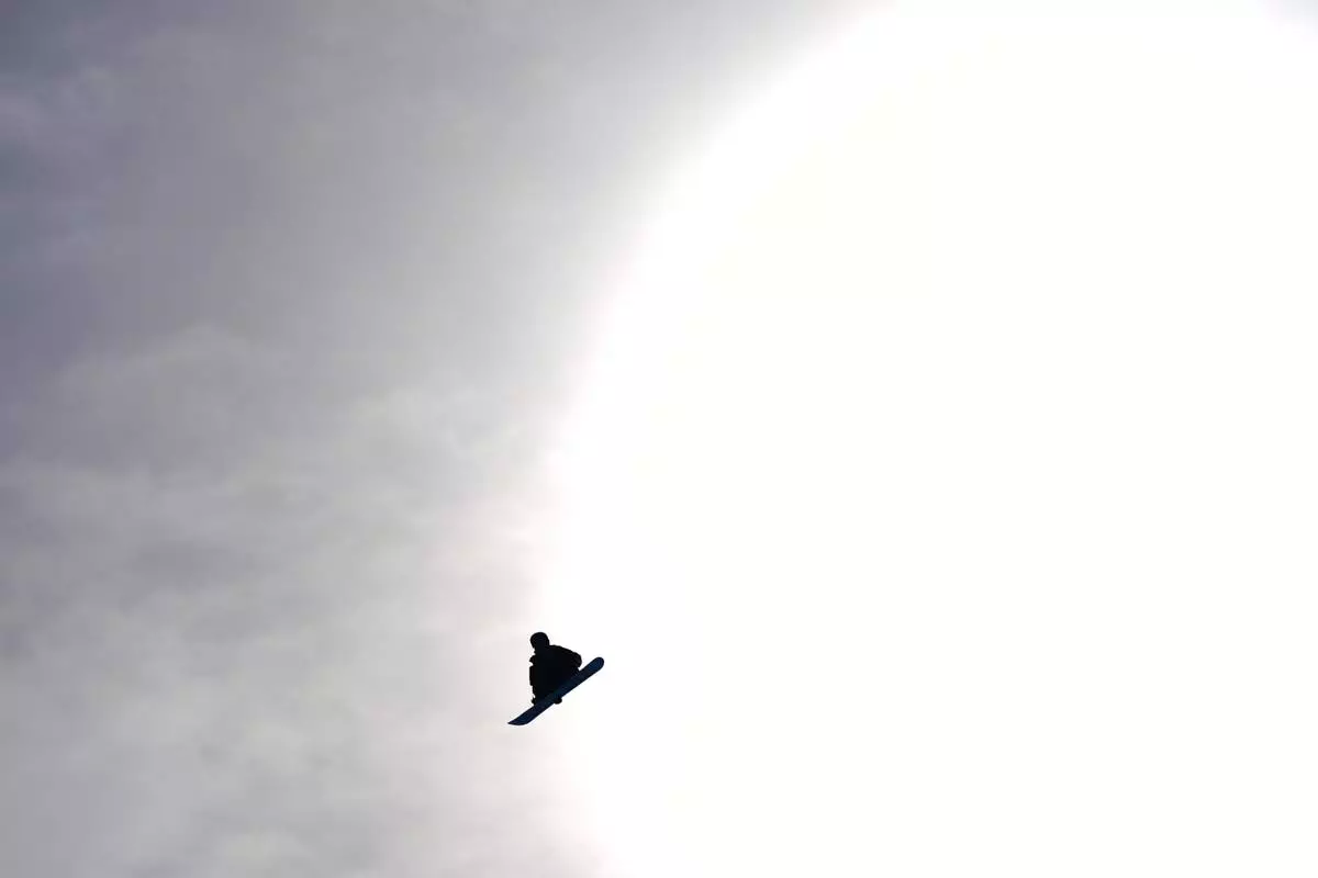 United States' Jake Canter practices before the men's snowboarding slopestyle finals at the 2026 Winter Olympics, in Livigno, Italy, Wednesday, Feb. 18, 2026. (AP Photo/Abbie Parr)