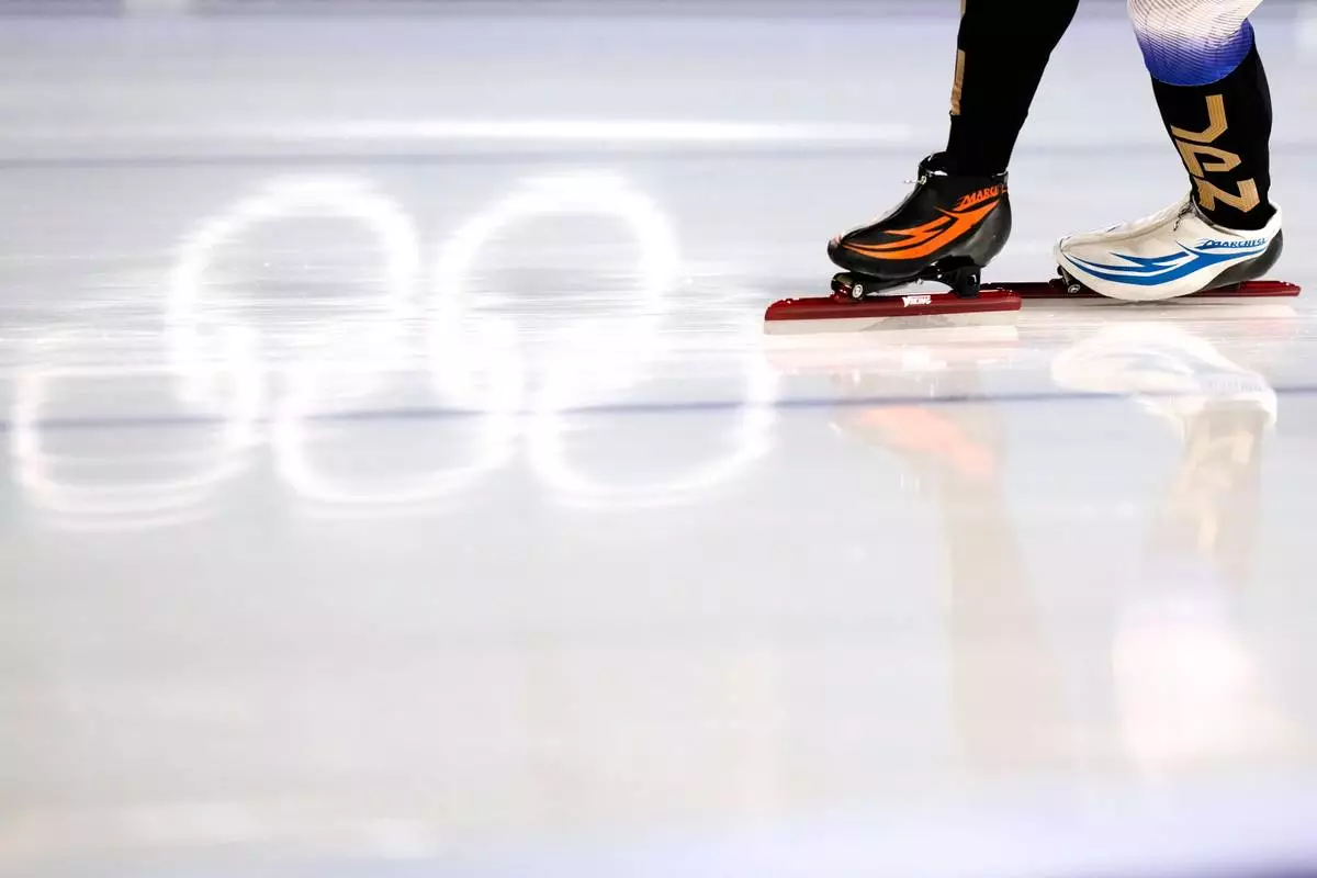 Shomu Sasaki of Japan warms up prior to competing in the men's 5,000 meters speedskating race at the 2026 Winter Olympics, in Milan, Italy, Sunday, Feb. 8, 2026. (AP Photo/Luca Bruno)