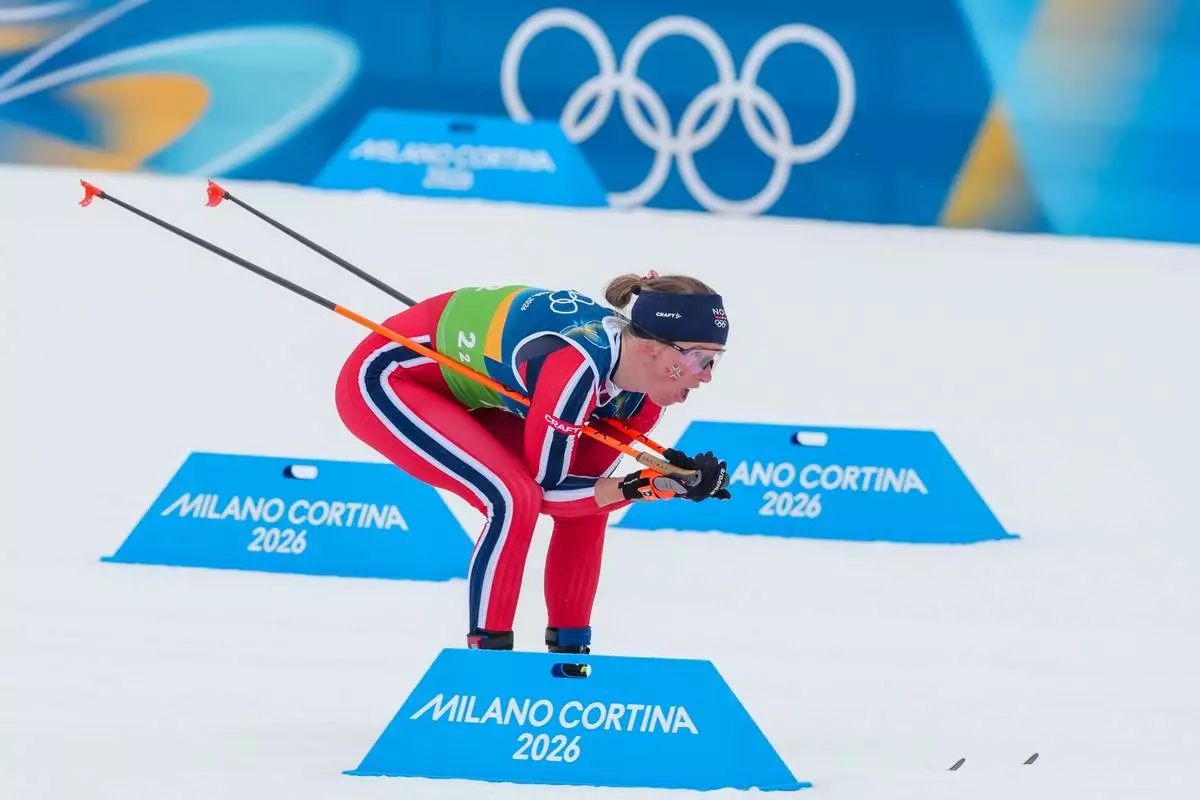 Astrid Oeyre Slind, of Norway, competes in the cross country skiing women's 4 x 7.5km relay at the 2026 Winter Olympics, in Tesero, Italy, Saturday, Feb. 14, 2026. (AP Photo/Kirsty Wigglesworth)